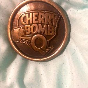 Cherry bomb belt buckle